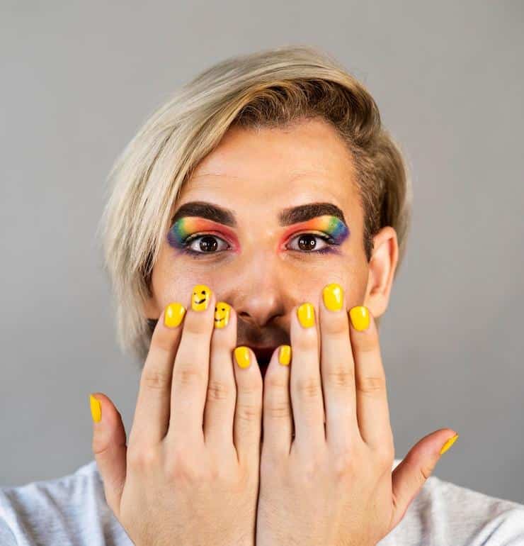 Crazy nail painting with orange and sky